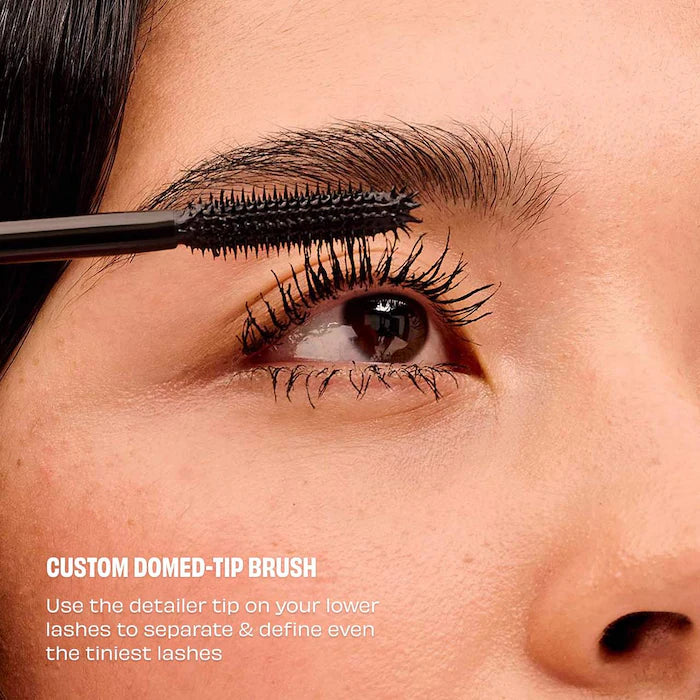 image showing closeup picture of girl using Benefit They're Real! Lengthening Mascara available at Heygirl.pk in Karachi, Lahore, Islamabad across Pakistan