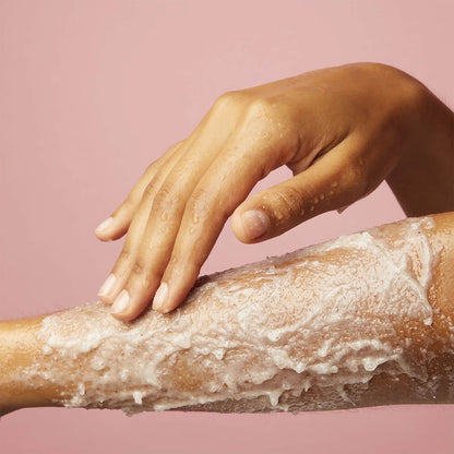 image showing Pakistani girl using Soap & Glory Flake Away Body Scrub available at Heygirl.pk for delivery in Pakistan