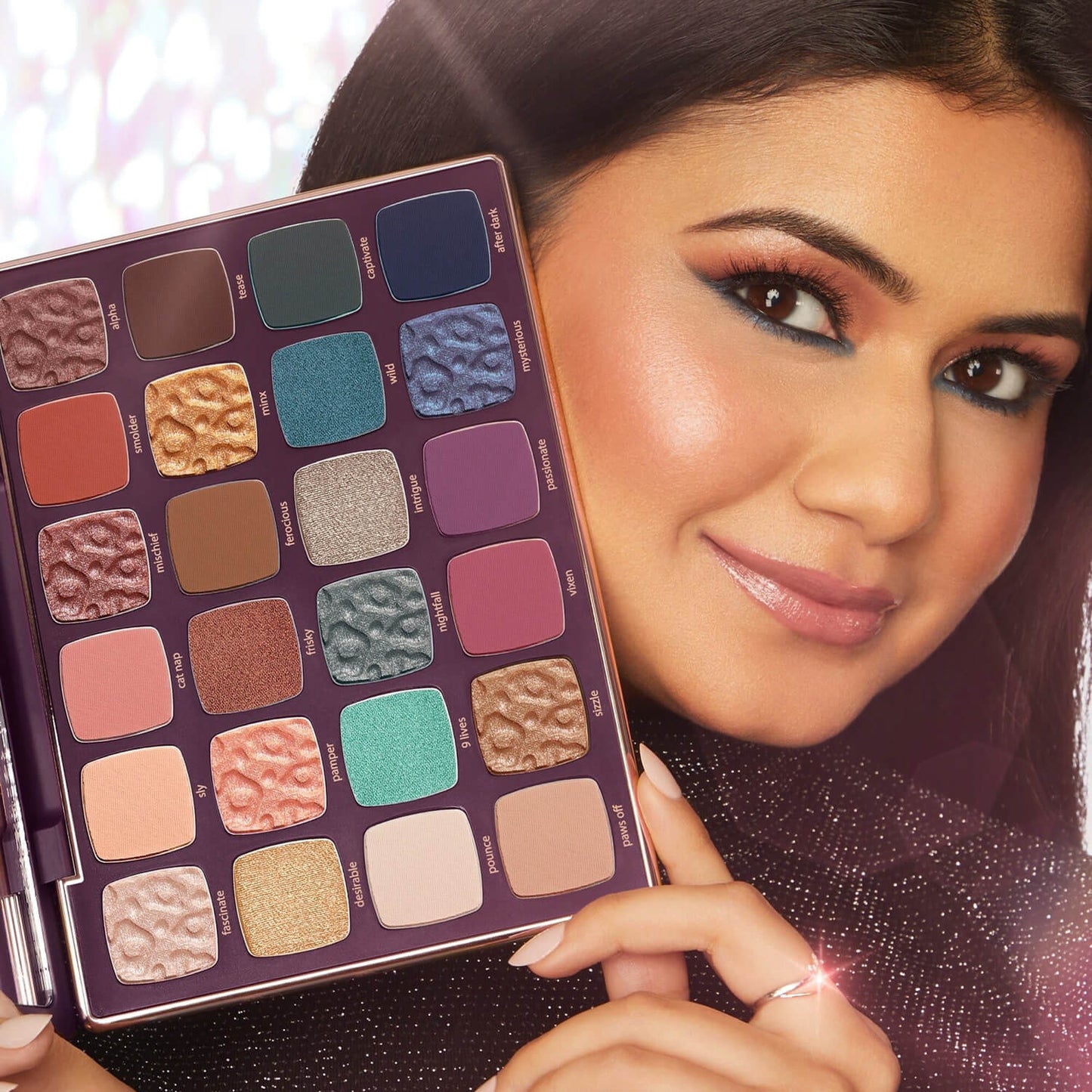 image showing beautiful girl with Tarte Maneater Eyeshadow Palette for her available at Heygirl.pk for delivery in Pakistan. 